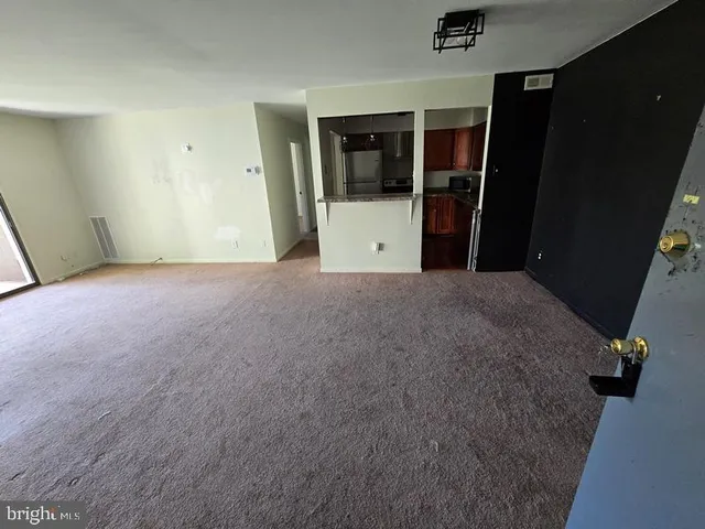 en empty room with windows