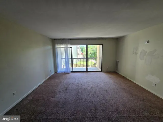 a view of a room with a window