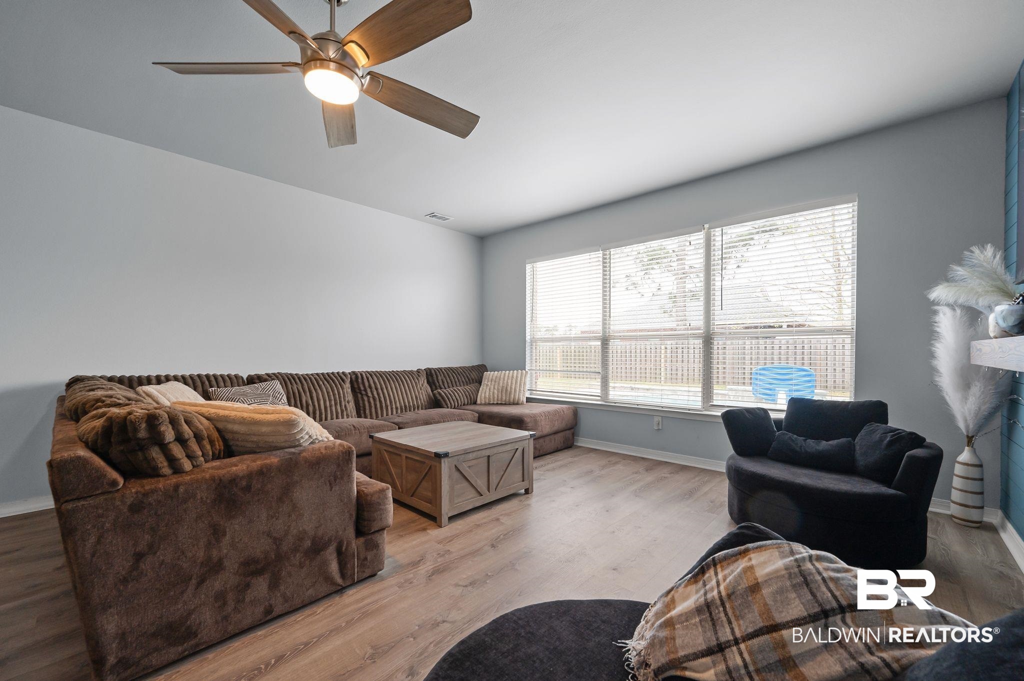 1287 Pembroke Way Foley, AL 36535 - Photo 9 of 39 Living room with light wood-style flooring and a ceiling fan