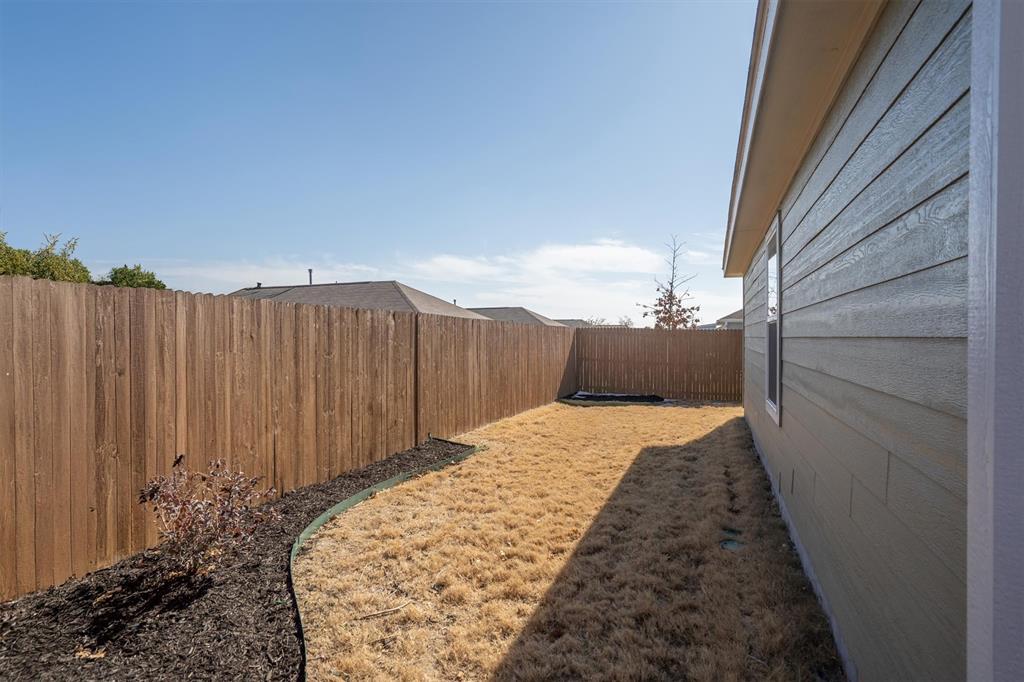 11850 Gabbro Drive Rhome, TX 76078 - Photo 21 of 24 Yard is sized for low maintenance