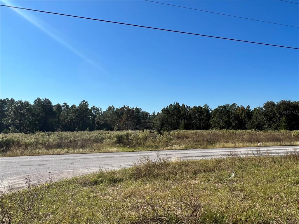 12160 Kadri Boulevard Spring Hill, FL 34608 - Photo 4 of 8 a view of a lake view