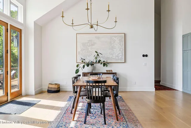 a large kitchen with stainless steel appliances granite countertop a lot of counter space and a sink