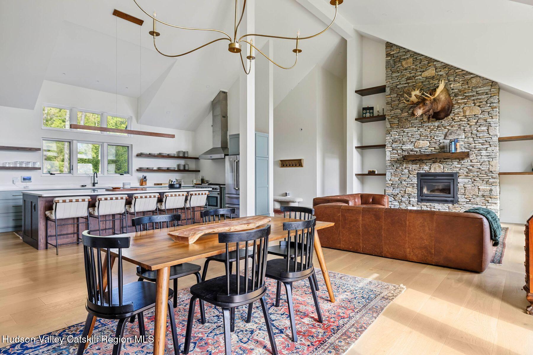 219 Club Road Windham, NY 12496 - Photo 16 of 103 a view of a dining room with furniture window and outside view