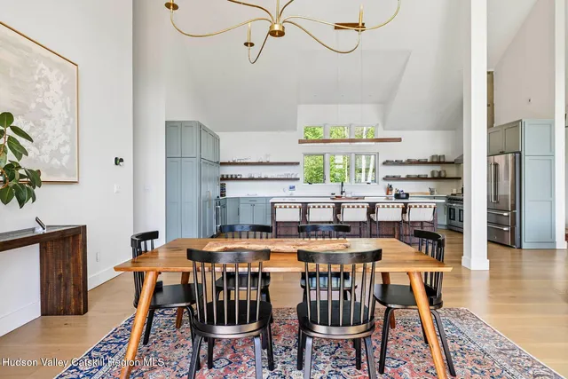 a bedroom with two beds and a couch