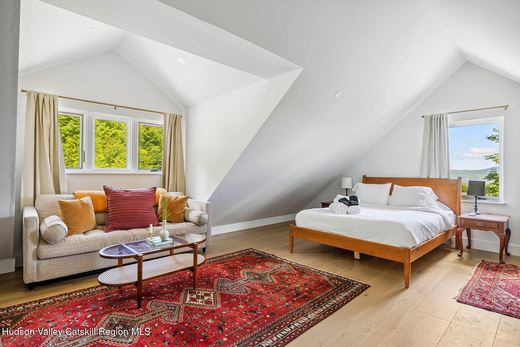 219 Club Road Windham, NY 12496 - Photo 28 of 103 a bedroom with two beds and a couch