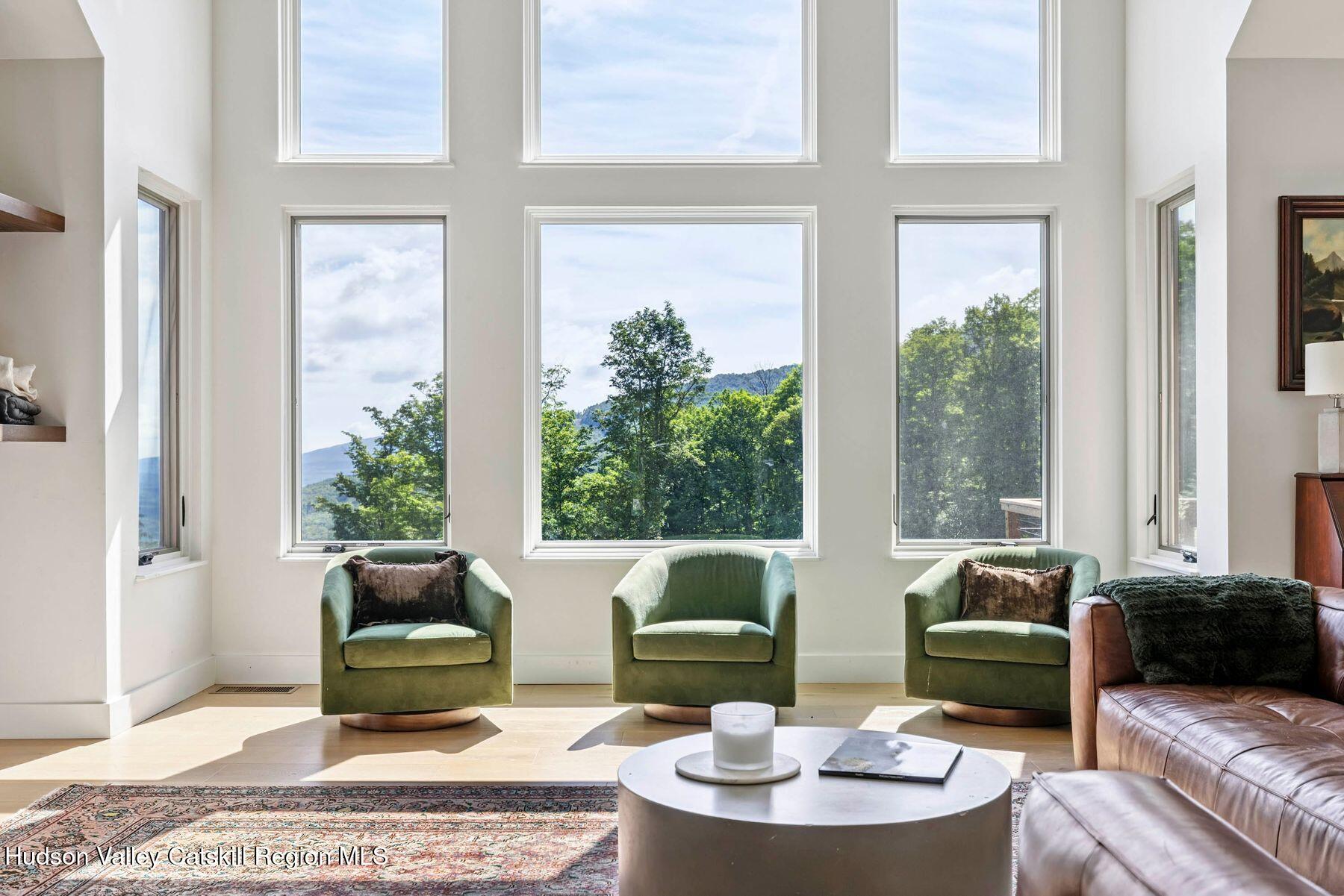 219 Club Road Windham, NY 12496 - Photo 5 of 103 a living room with furniture and a large window
