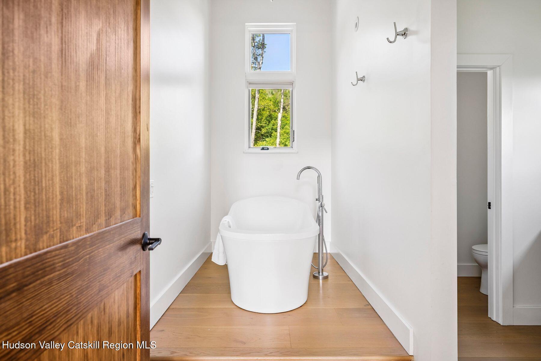 219 Club Road Windham, NY 12496 - Photo 56 of 103 a view of a hallway with seating area