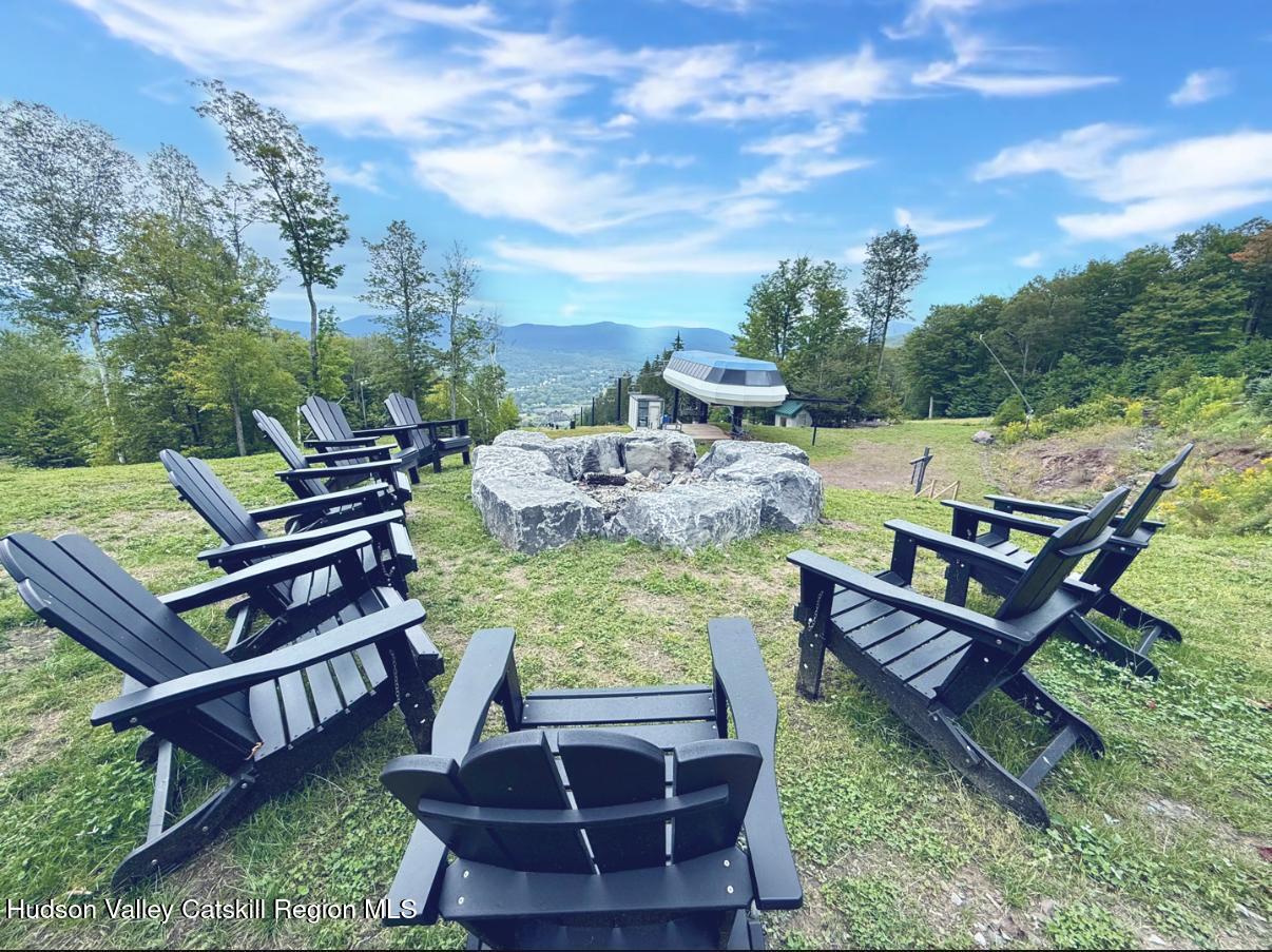 219 Club Road Windham, NY 12496 - Photo 100 of 103 a view of a chairs and table in the yard