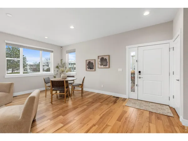 a view of dining room with furniture and window