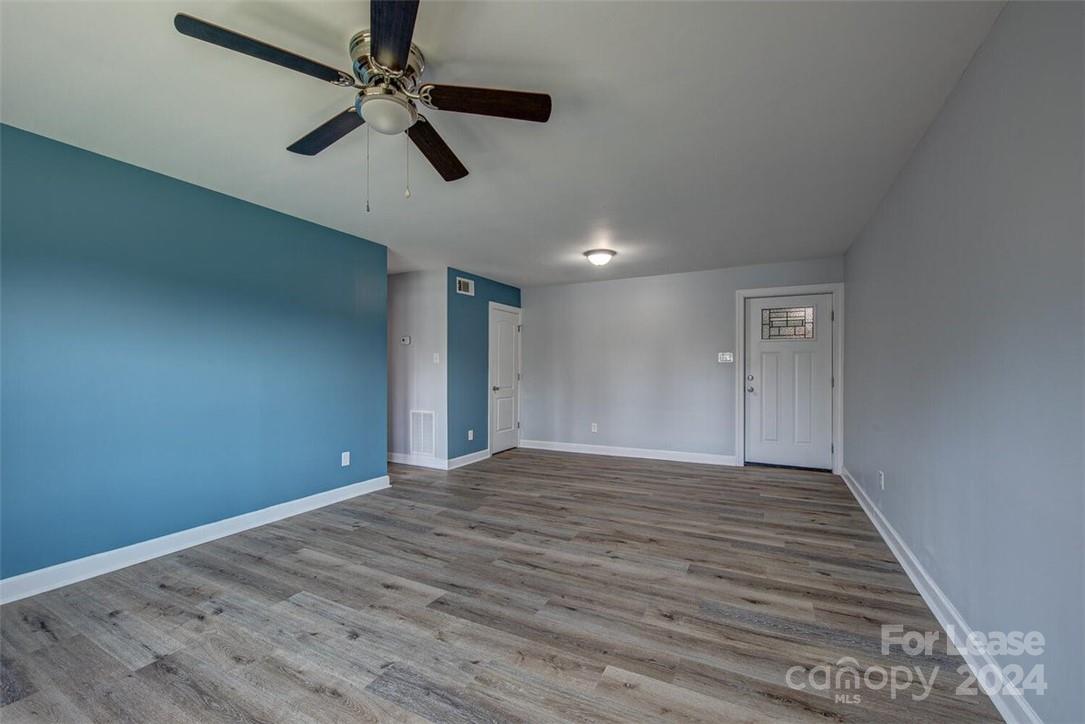 1024 Avondale Road, Unit 4 Lowell, NC 28098 - Photo 5 of 11 a view of an empty room with a window