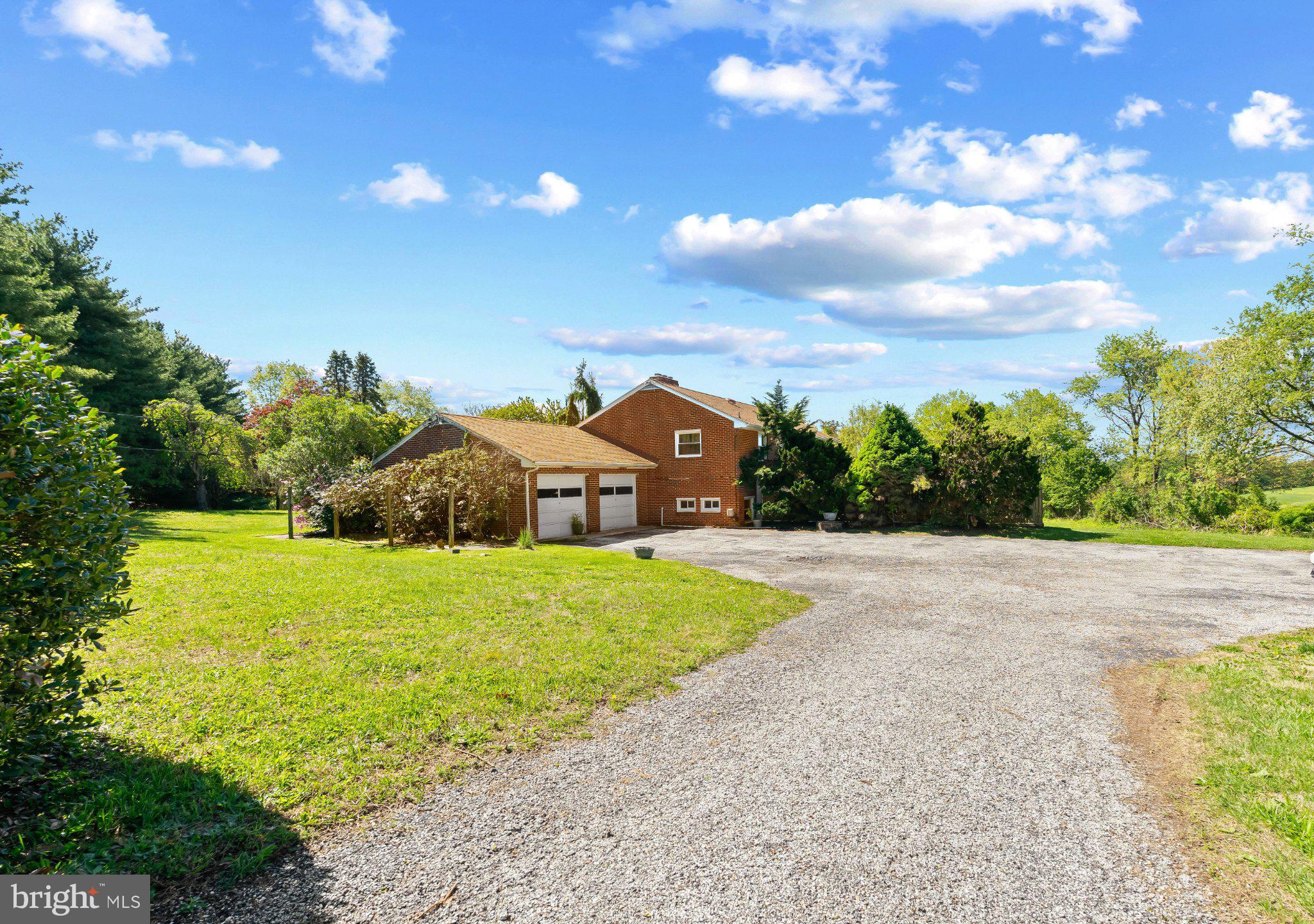 Charming home on spacious grounds.