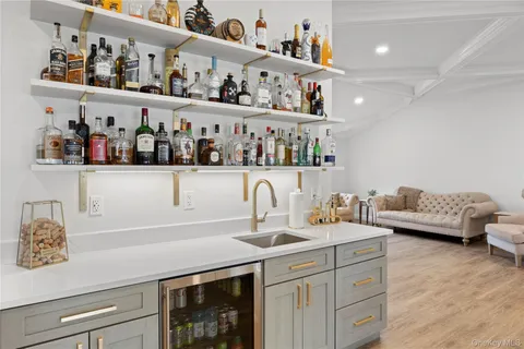 a kitchen with cabinets and window
