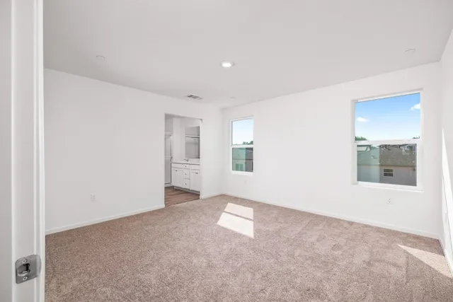 an empty room with windows