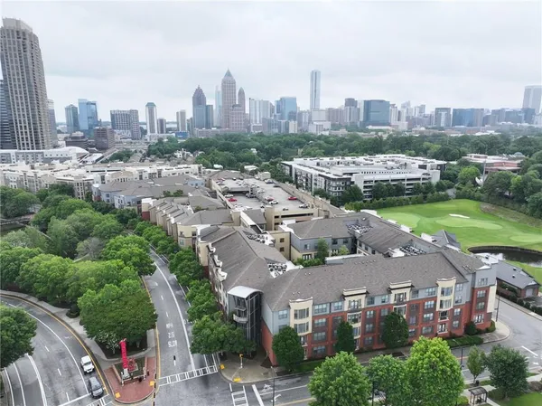 an aerial view of a city with lots of residential buildings