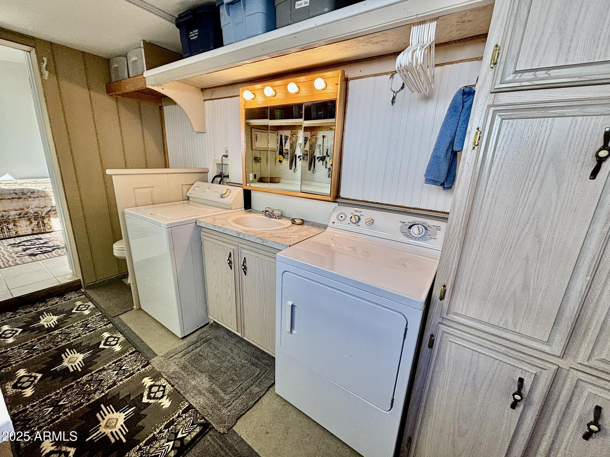 1050 East Broadway Avenue, Unit 44 Apache Junction, AZ 85119 - Photo 21 of 40 a utility room with dryer and washer
