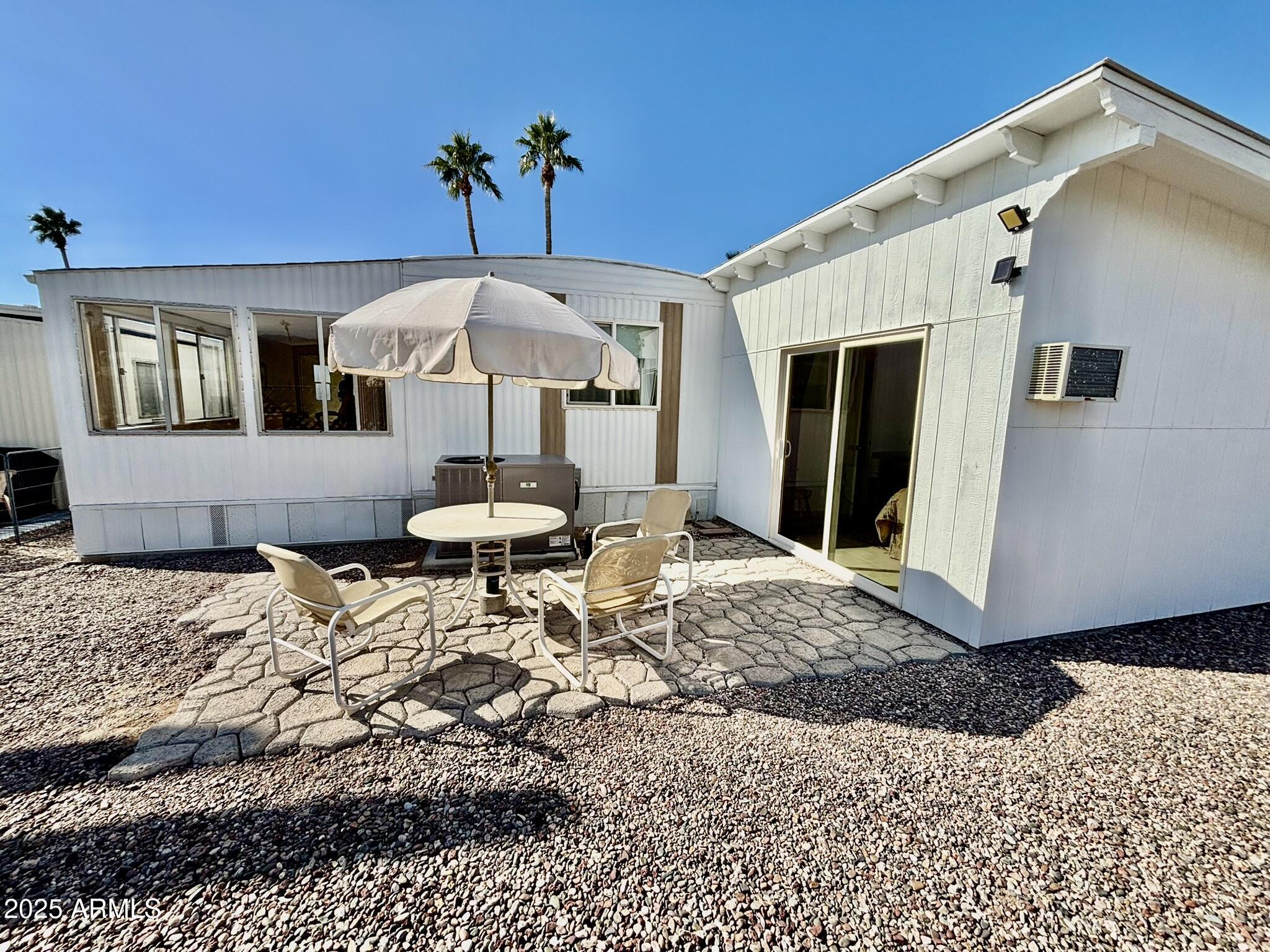 1050 East Broadway Avenue, Unit 44 Apache Junction, AZ 85119 - Photo 23 of 40 a living room with a couch