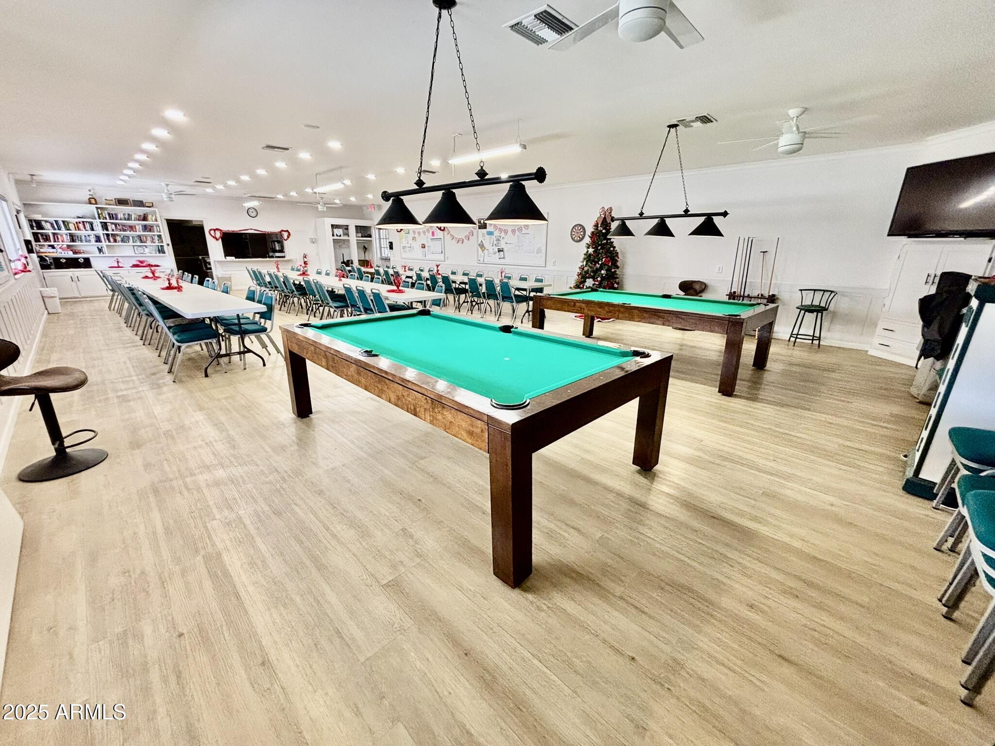 1050 East Broadway Avenue, Unit 44 Apache Junction, AZ 85119 - Photo 29 of 40 a living room with lots of furniture and a wooden floor