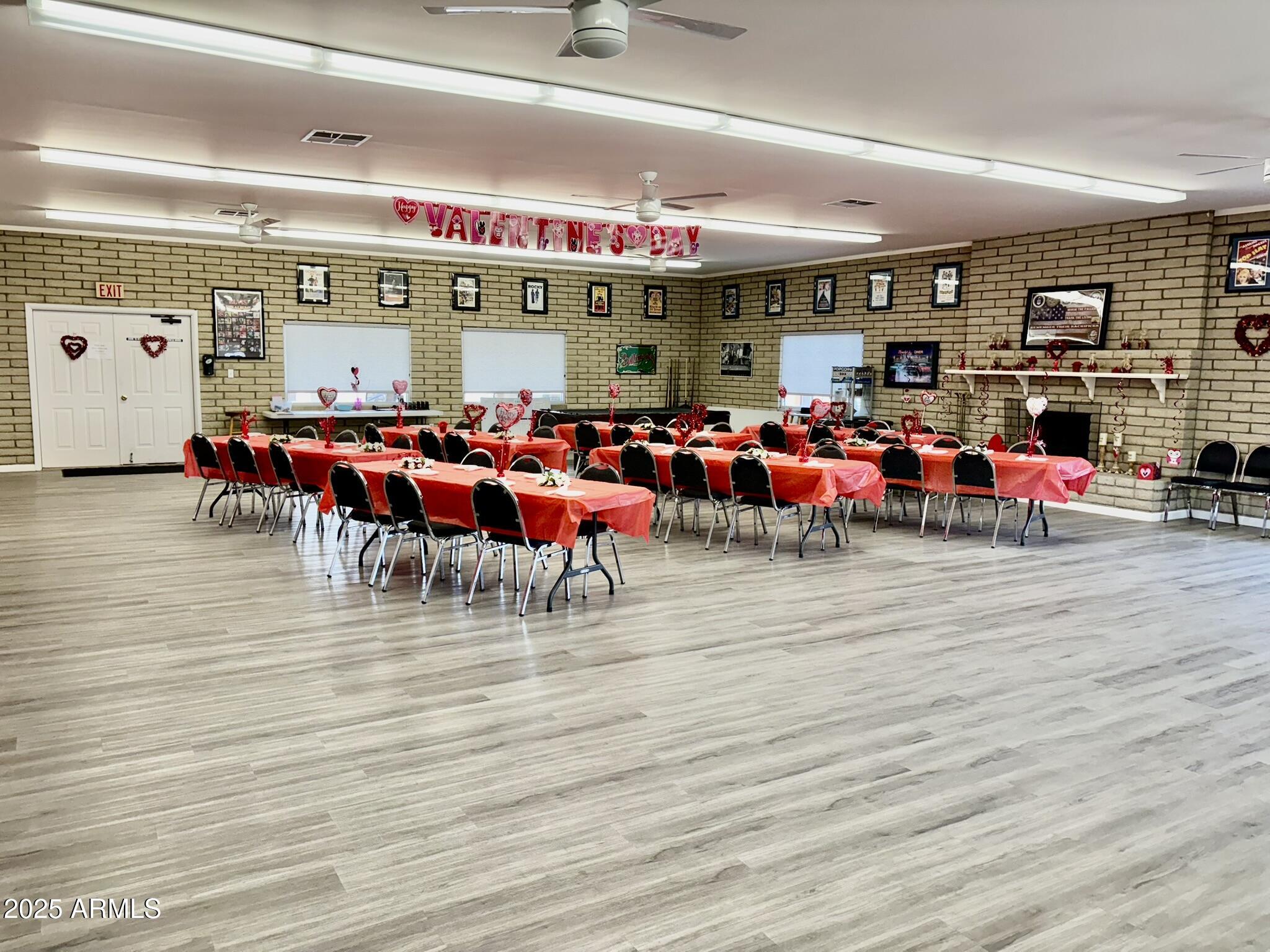 1050 East Broadway Avenue, Unit 44 Apache Junction, AZ 85119 - Photo 31 of 40 a living room with lots of furniture and a flat screen tv