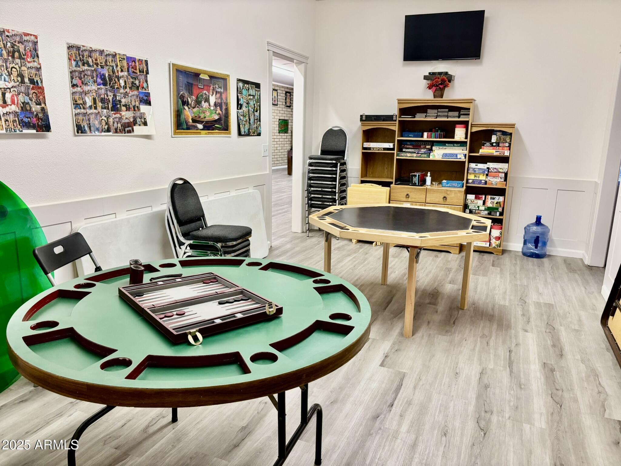 1050 East Broadway Avenue, Unit 44 Apache Junction, AZ 85119 - Photo 35 of 40 a room with furniture and a wooden floor