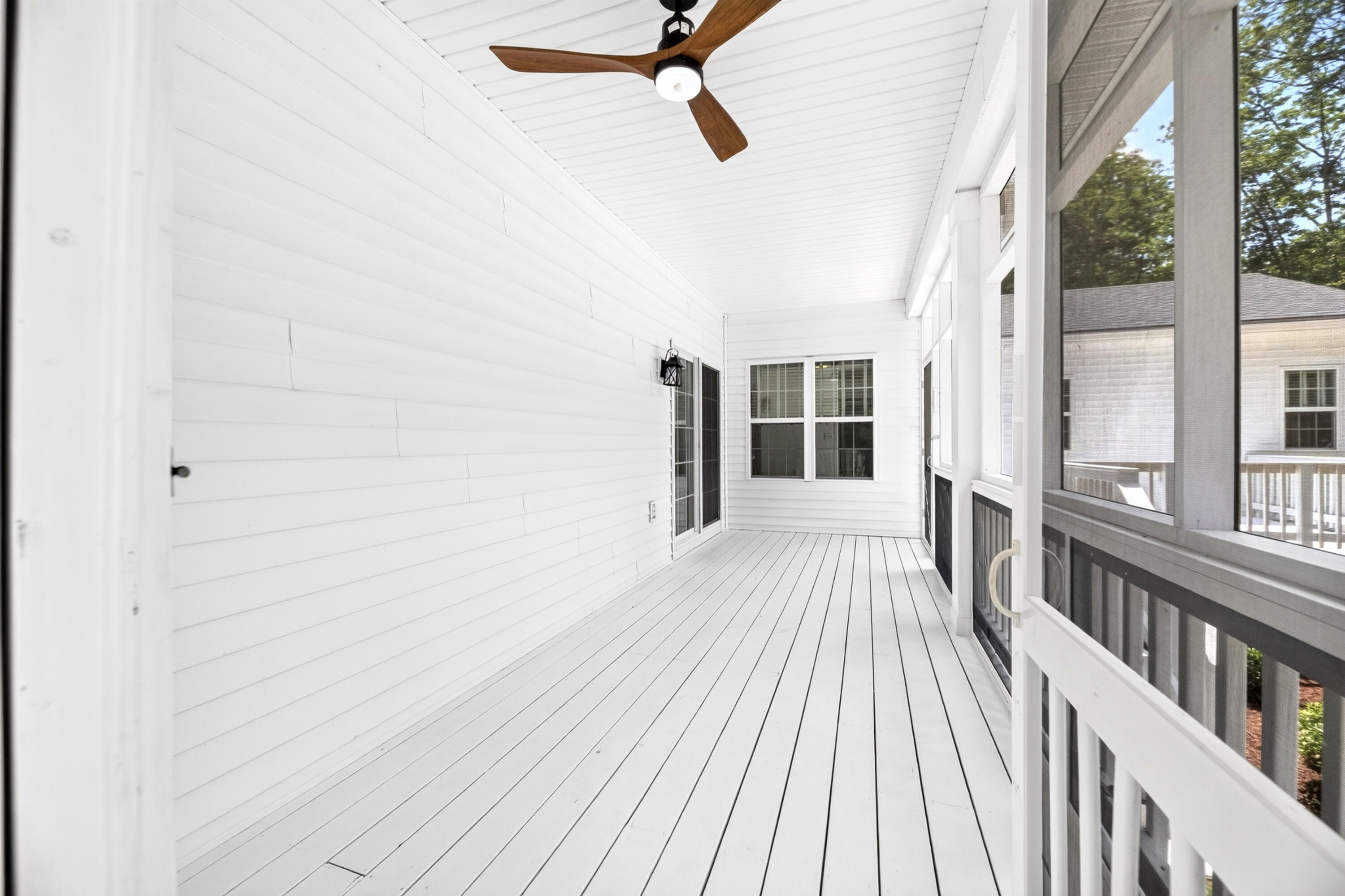 315 Griffith Lane Elloree, SC 29047 - Photo 39 of 40 Deck Screened in Off Dining Room