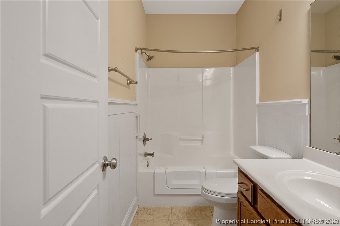 32 Shellnut Circle Spring Lake, NC 28390 - Photo 27 of 50 a bathroom with a sink a toilet and shower