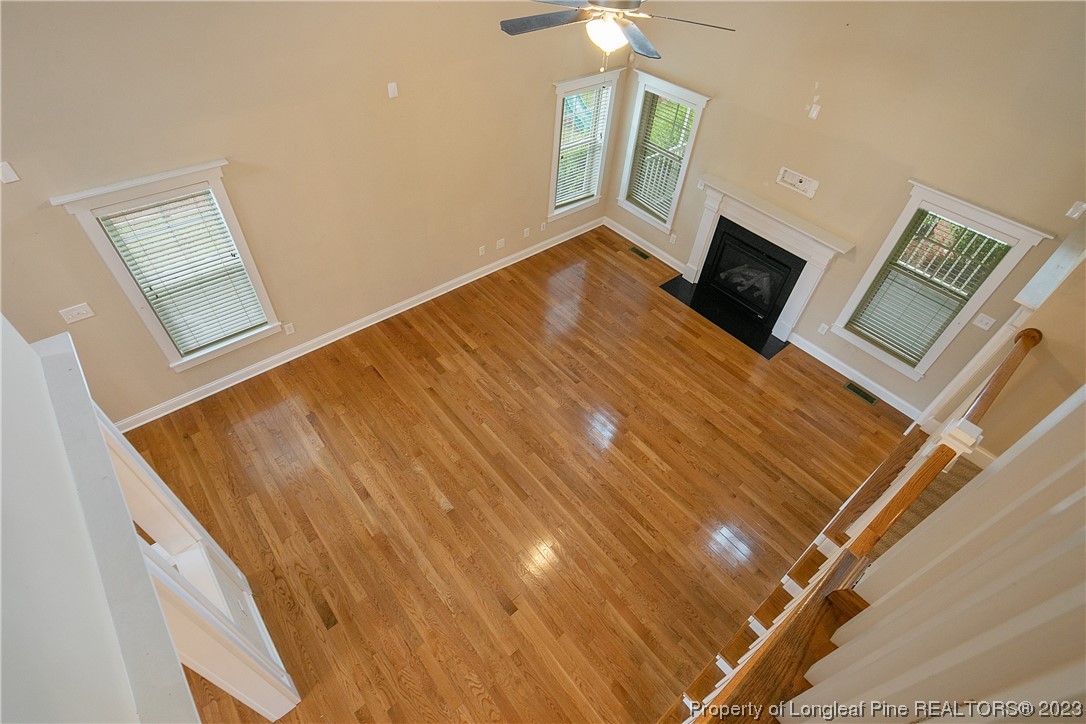 32 Shellnut Circle Spring Lake, NC 28390 - Photo 28 of 50 a bedroom with a bed and wooden floor