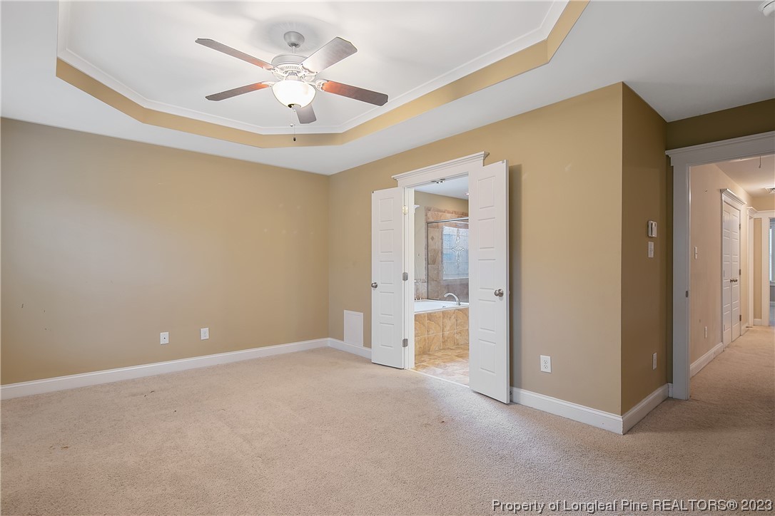 32 Shellnut Circle Spring Lake, NC 28390 - Photo 30 of 50 wooden floor in an empty room and a chandelier fan