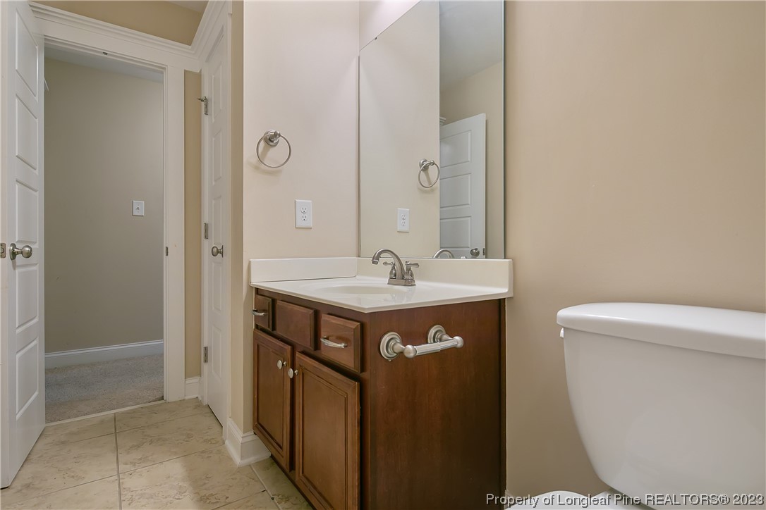 32 Shellnut Circle Spring Lake, NC 28390 - Photo 43 of 50 a spacious bathroom with a sink a toilet and shower