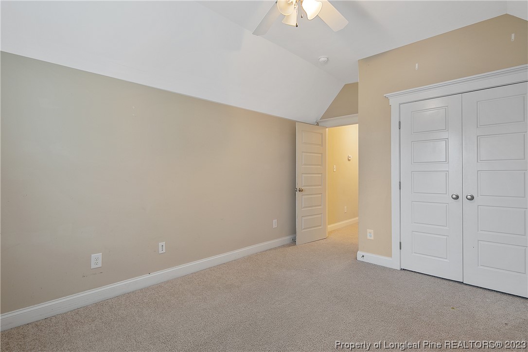 32 Shellnut Circle Spring Lake, NC 28390 - Photo 46 of 50 an empty room with a empty space and a ceiling fan