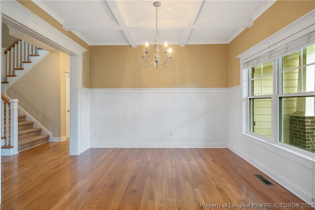 32 Shellnut Circle Spring Lake, NC 28390 - Photo 7 of 50 a view of an empty room with wooden floor and a window