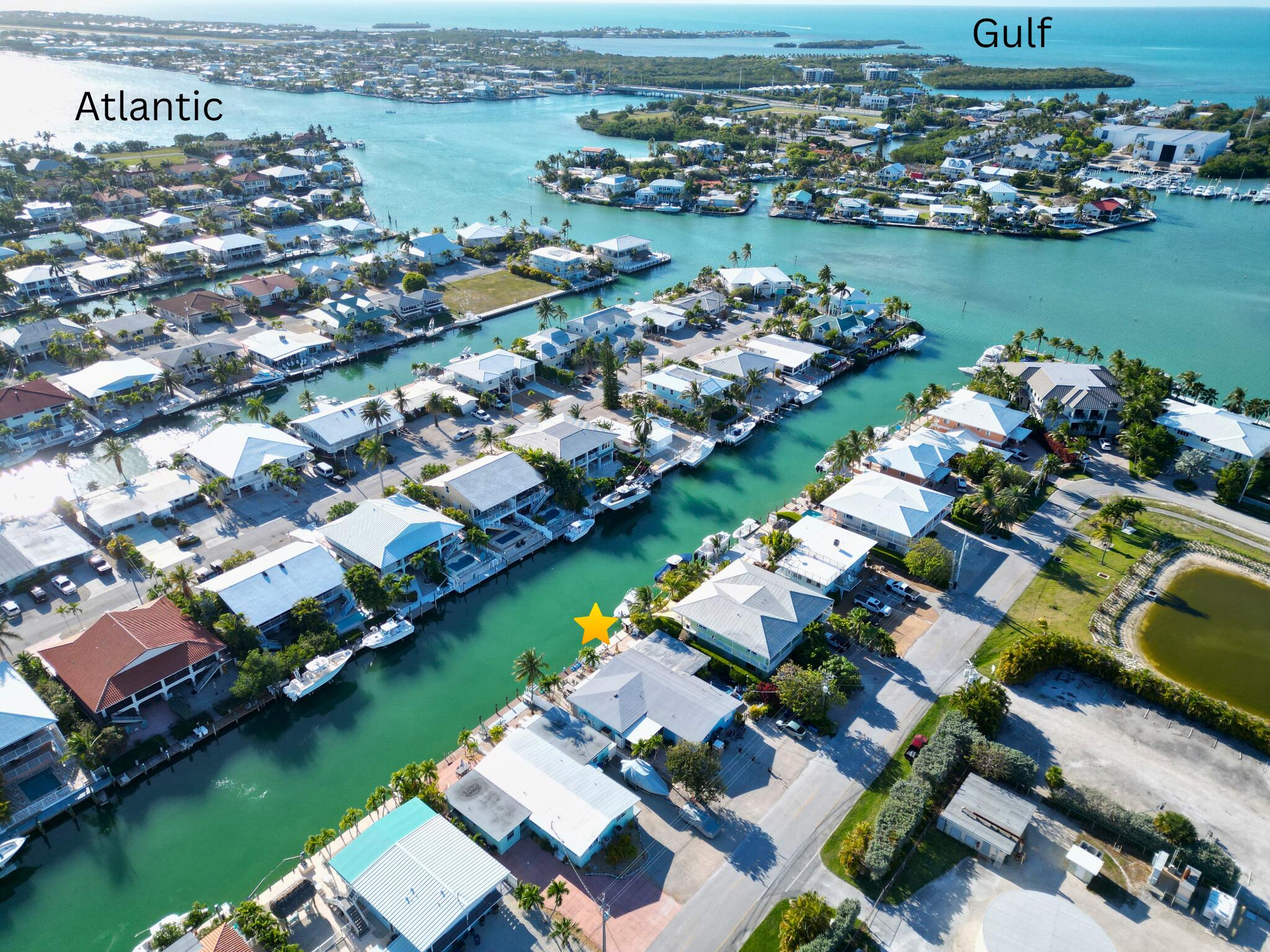 611 8th Street Key Colony Beach, FL 33051 - Photo 37 of 37 an aerial view of a house with a lake view