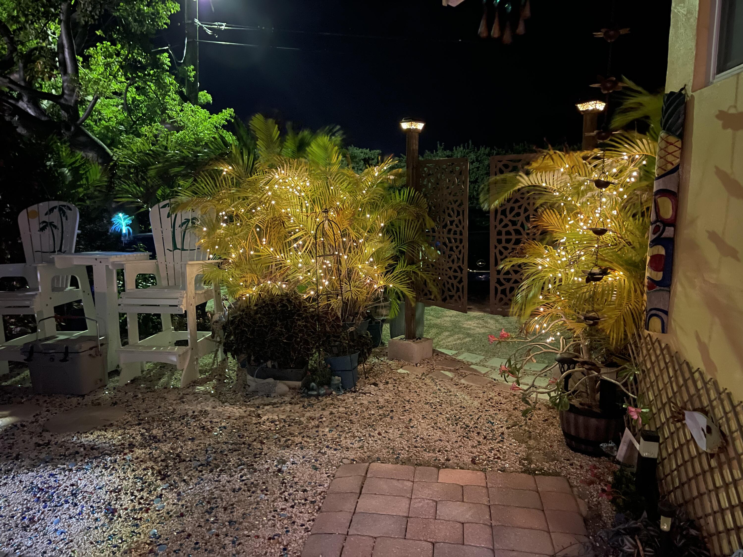 611 8th Street Key Colony Beach, FL 33051 - Photo 7 of 36 Interior courtyard at night