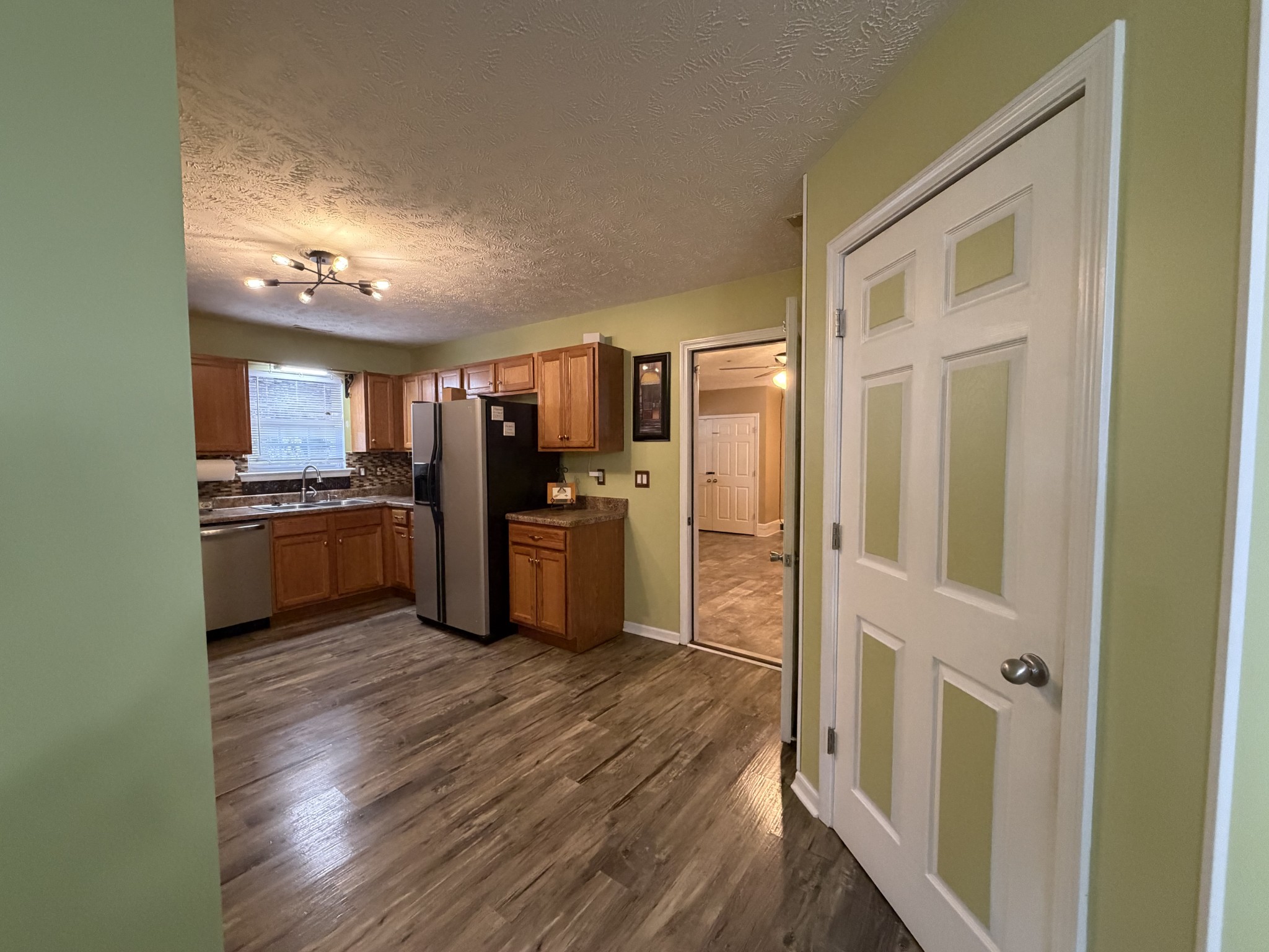 2938 Ridgewood Drive Christiana, TN 37037 - Photo 12 of 66 a kitchen with cabinets and stainless steel appliances
