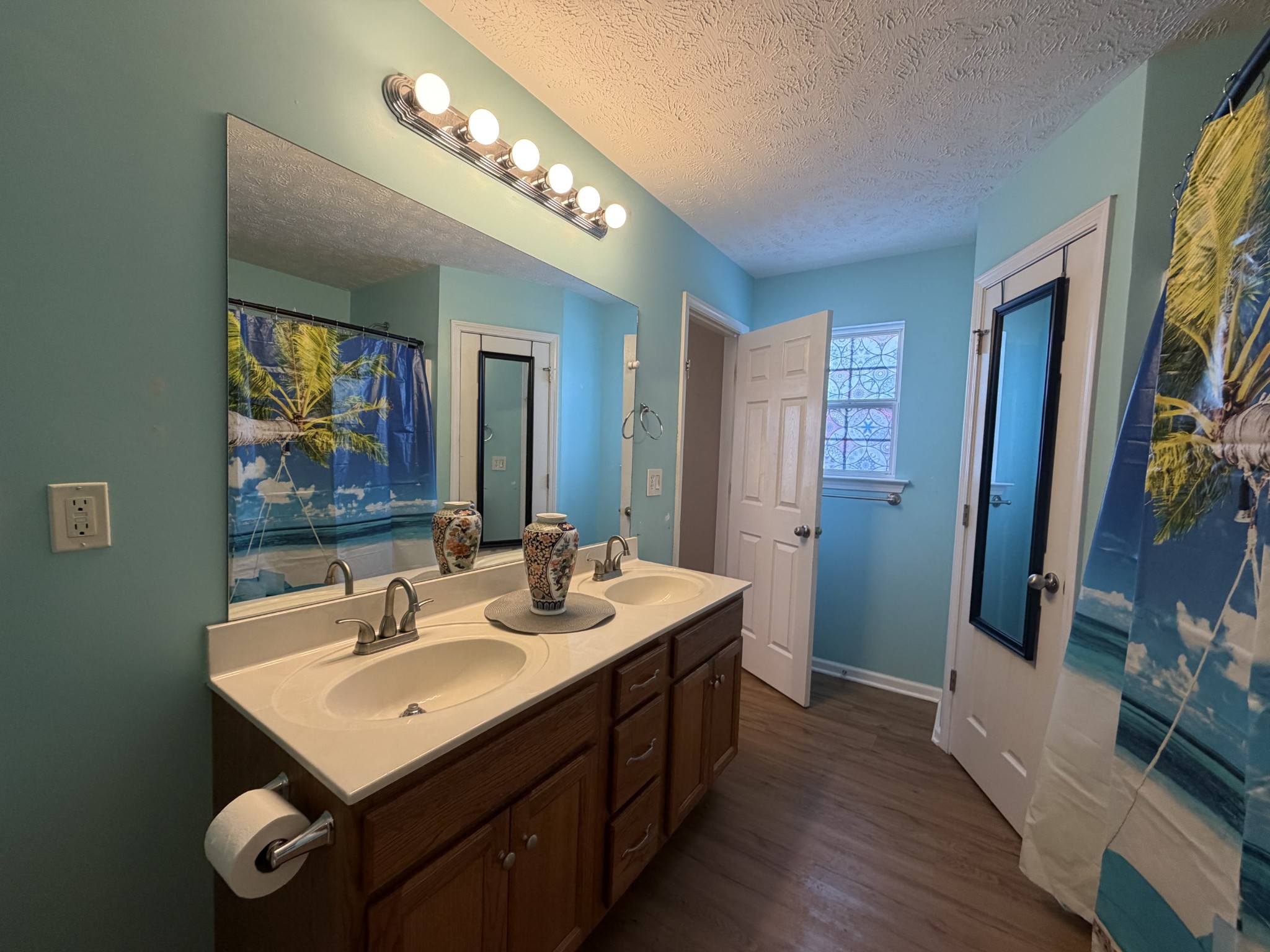 2938 Ridgewood Drive Christiana, TN 37037 - Photo 38 of 66 a bathroom with a sink double vanity granite tub and shower
