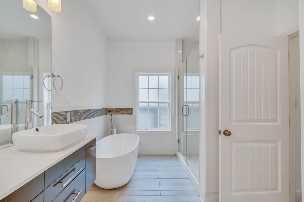 2405 Keene Street Houston, TX 77009 - Photo 21 of 45 a bathroom with a sink toilet and shower