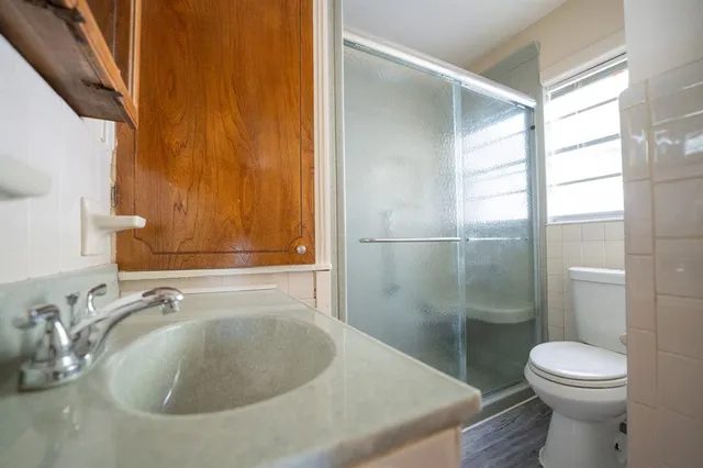 a bathroom with a sink and a toilet