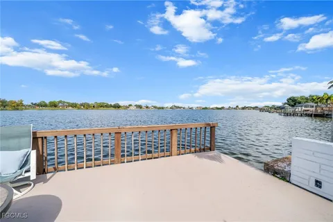 a view of a terrace with a lake view