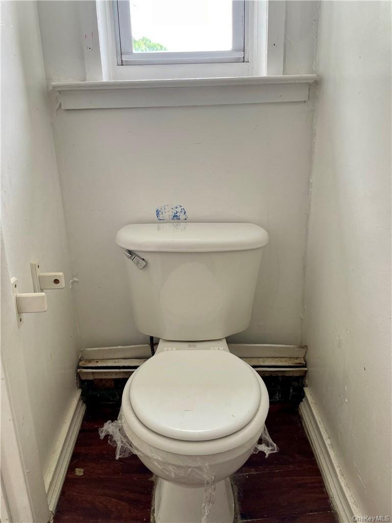 27 Fox Island Road Port Chester, NY 10573 - Photo 11 of 29 a bathroom with a toilet and a sink