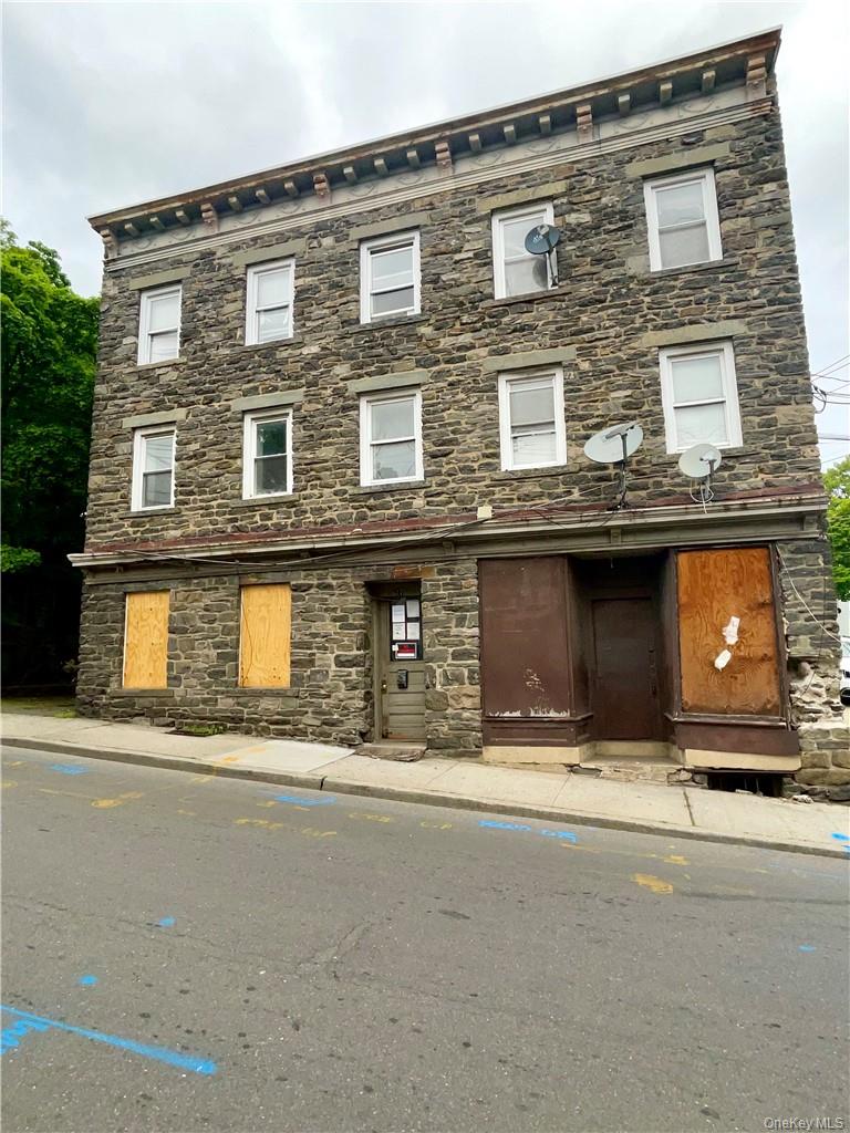 27 Fox Island Road Port Chester, NY 10573 - Photo 2 of 29 a front view of a house with yard
