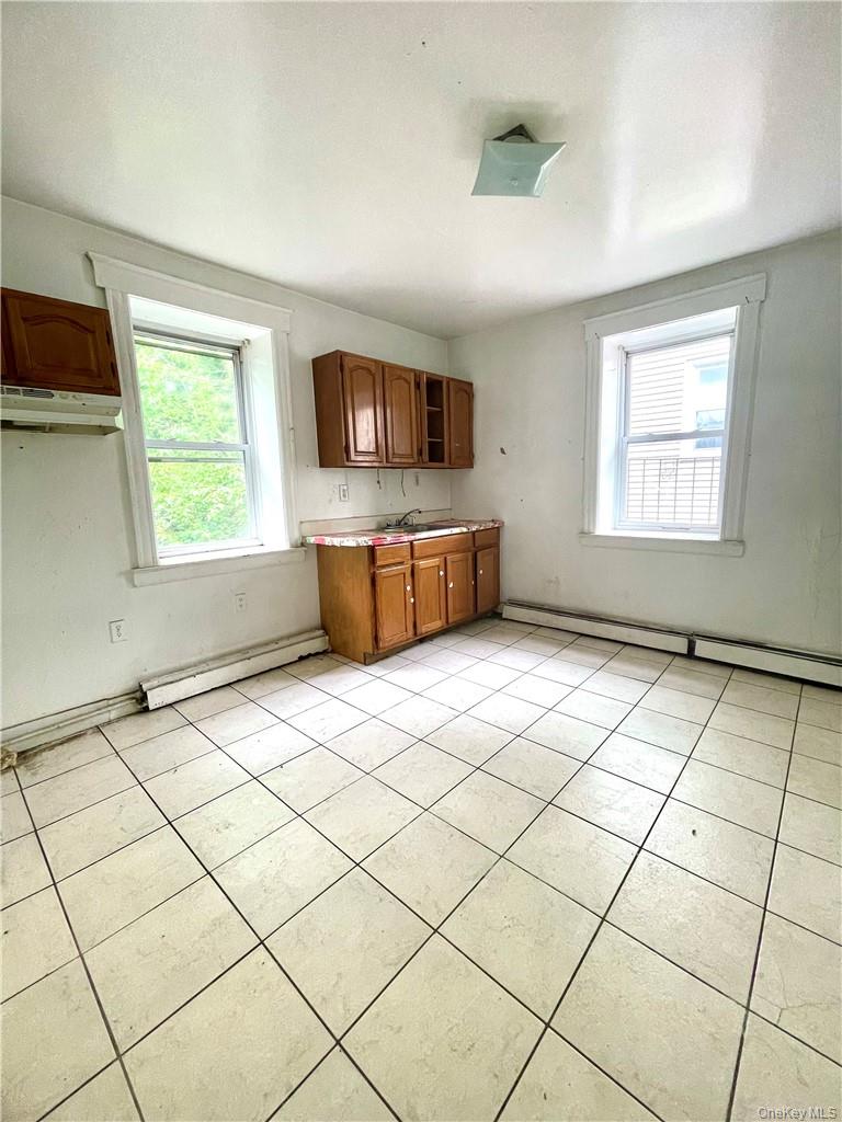 27 Fox Island Road Port Chester, NY 10573 - Photo 8 of 29 a view of a livingroom with a window