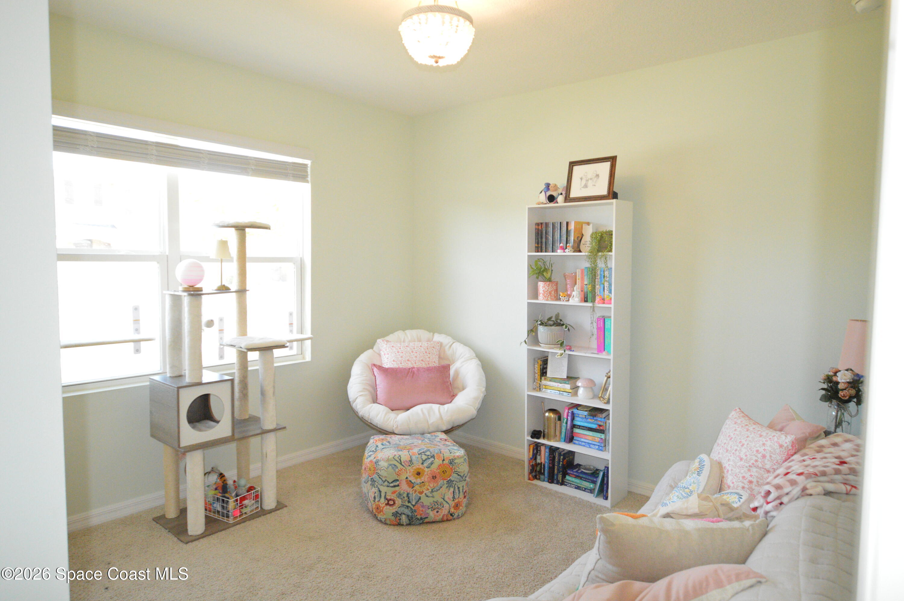 999 Trinity Street Rockledge, FL 32955 - Photo 11 of 20 a room with toys and a wooden floor