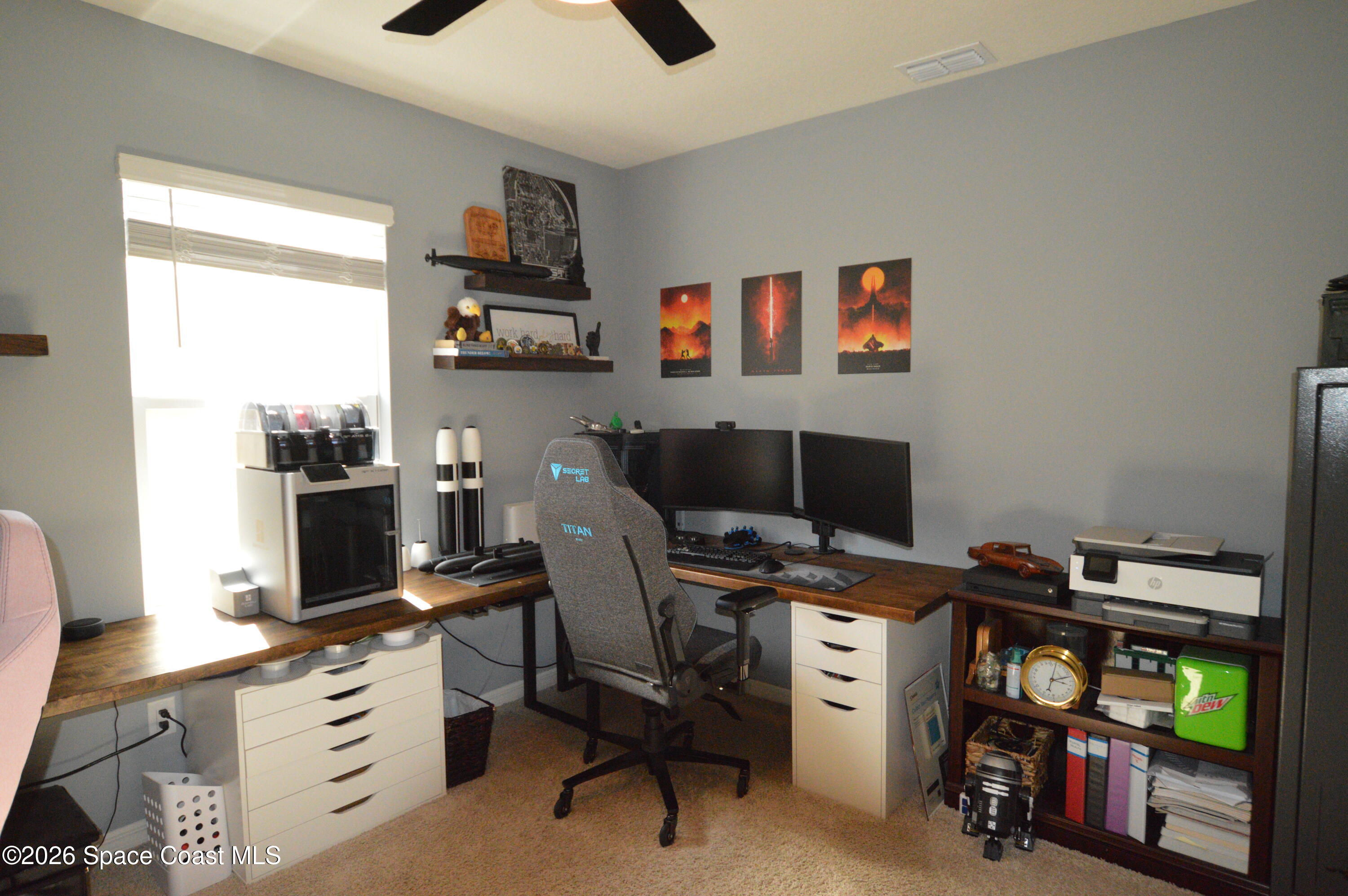 999 Trinity Street Rockledge, FL 32955 - Photo 13 of 20 a workspace with furniture and window