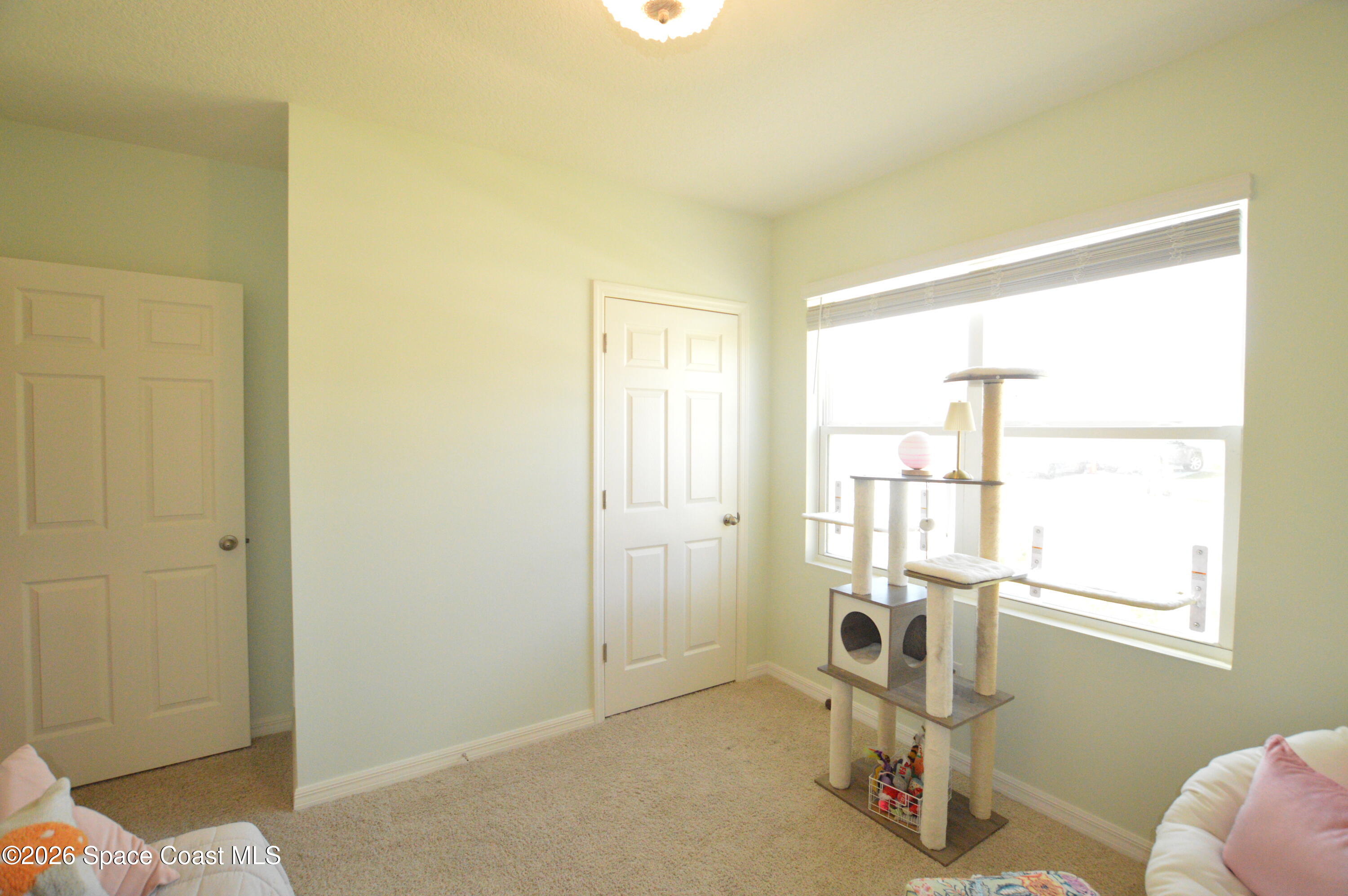 999 Trinity Street Rockledge, FL 32955 - Photo 10 of 20 a view of a room with gym equipment