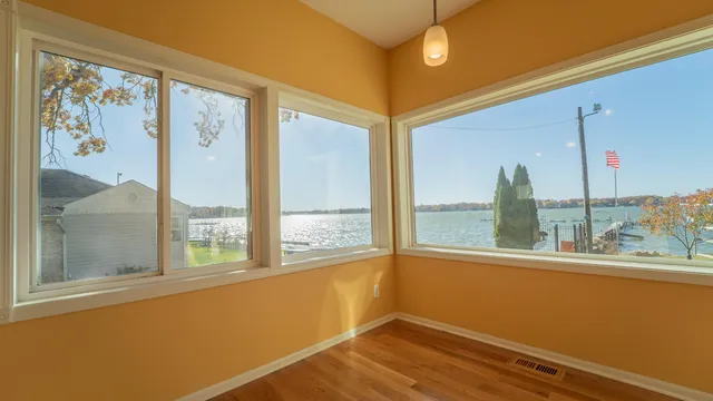 a view of a room with a large window