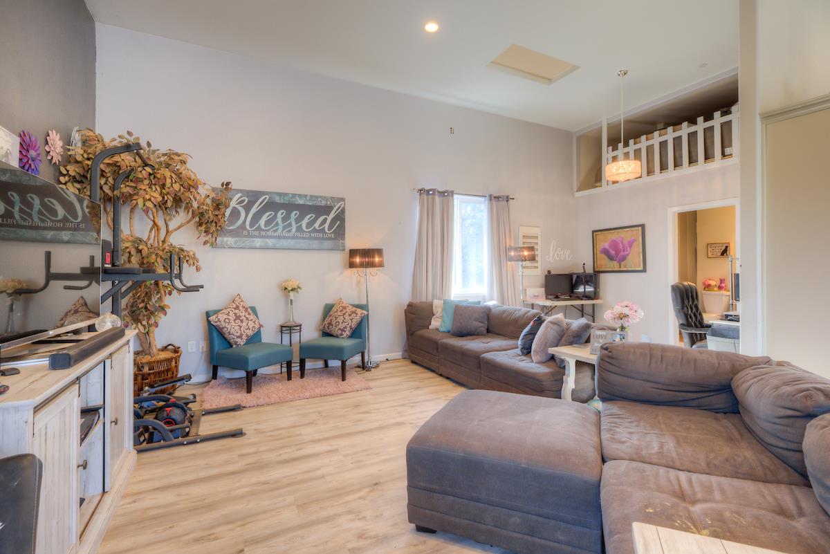83 Northfork Road Berry Creek, CA 95916 - Photo 34 of 56 a living room with furniture and a flat screen tv