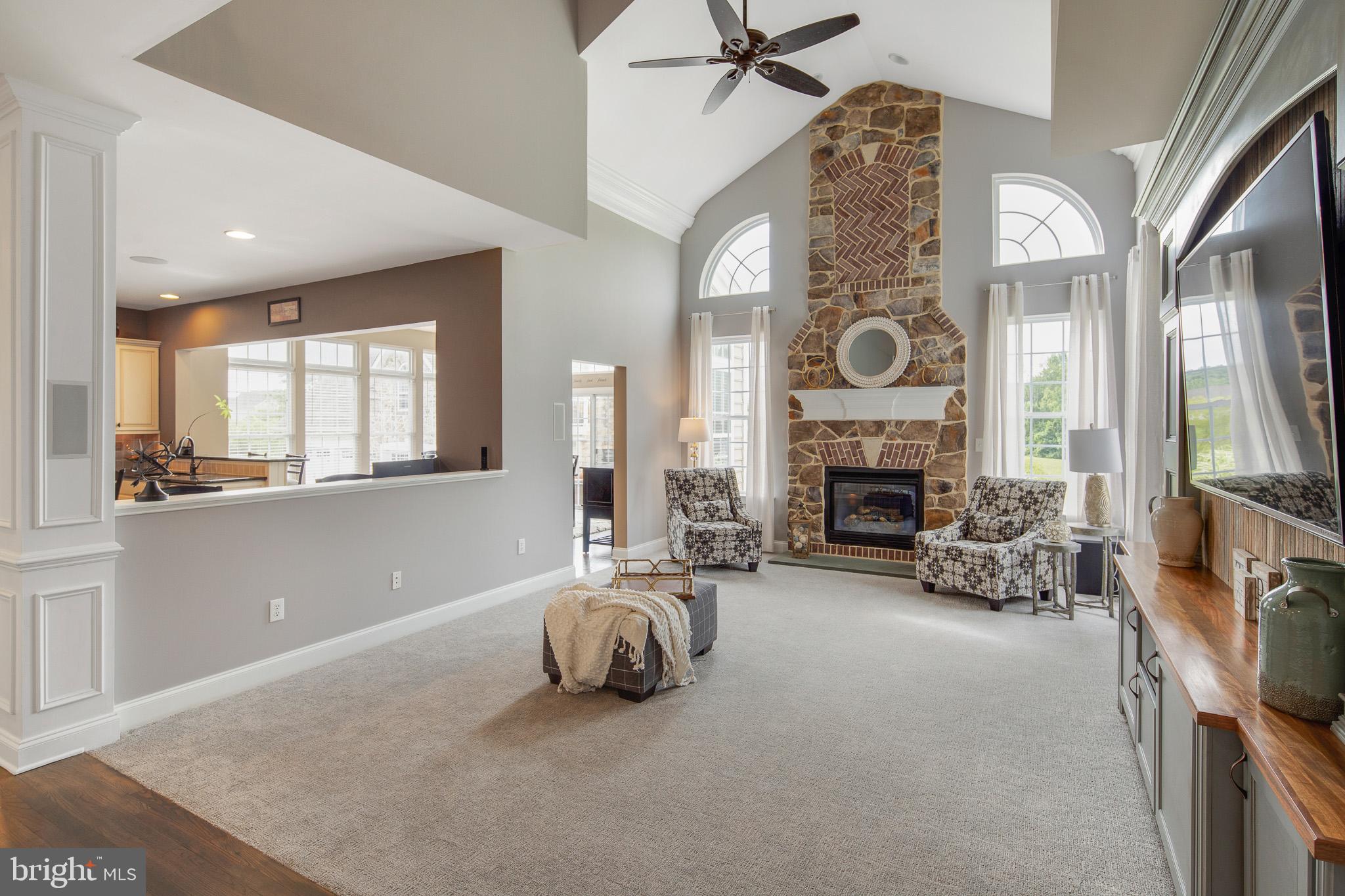 440 Spring Hollow Drive Middletown, DE 19709 - Photo 11 of 64 a living room with furniture and a fireplace