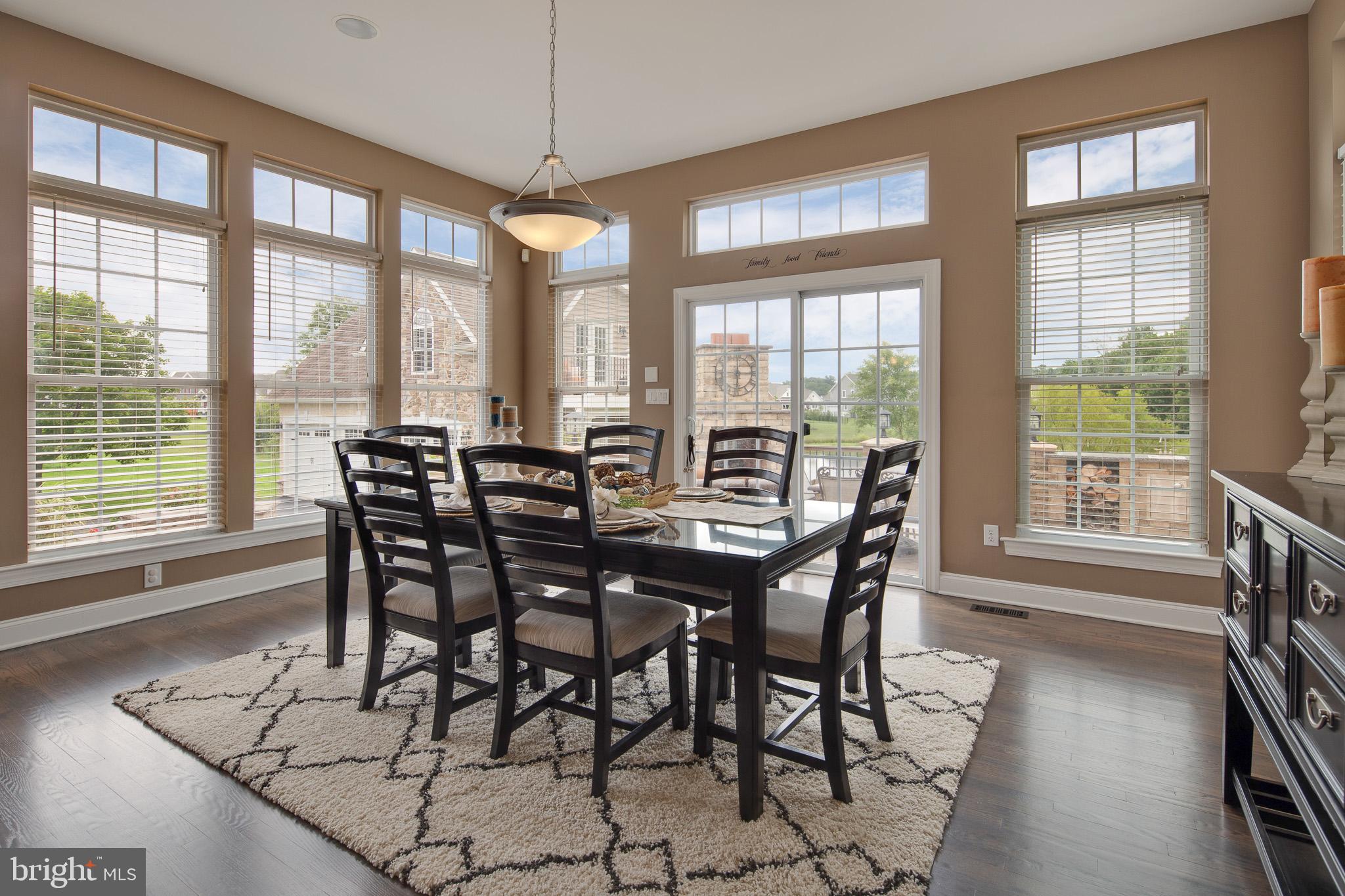 440 Spring Hollow Drive Middletown, DE 19709 - Photo 15 of 64 a view of a dining room with furniture window and outside view
