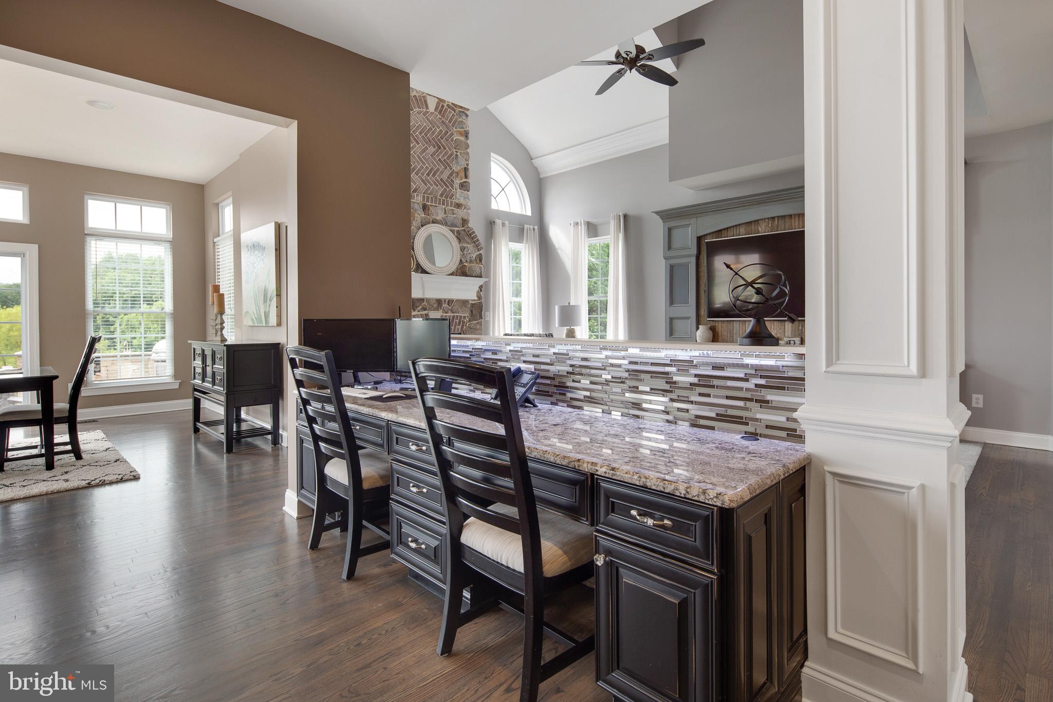 440 Spring Hollow Drive Middletown, DE 19709 - Photo 16 of 64 a kitchen with a table and chairs in it