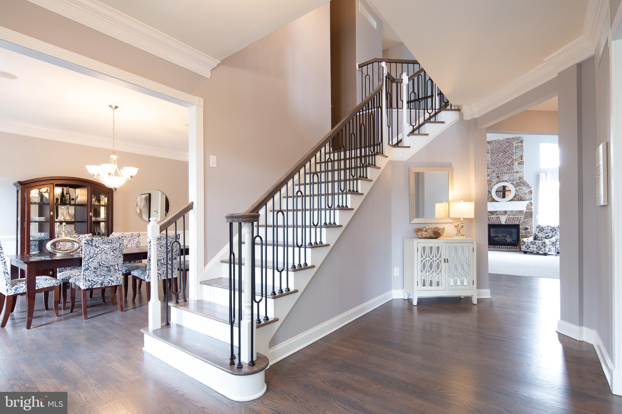 440 Spring Hollow Drive Middletown, DE 19709 - Photo 3 of 64 a view of entryway and hall with wooden floor