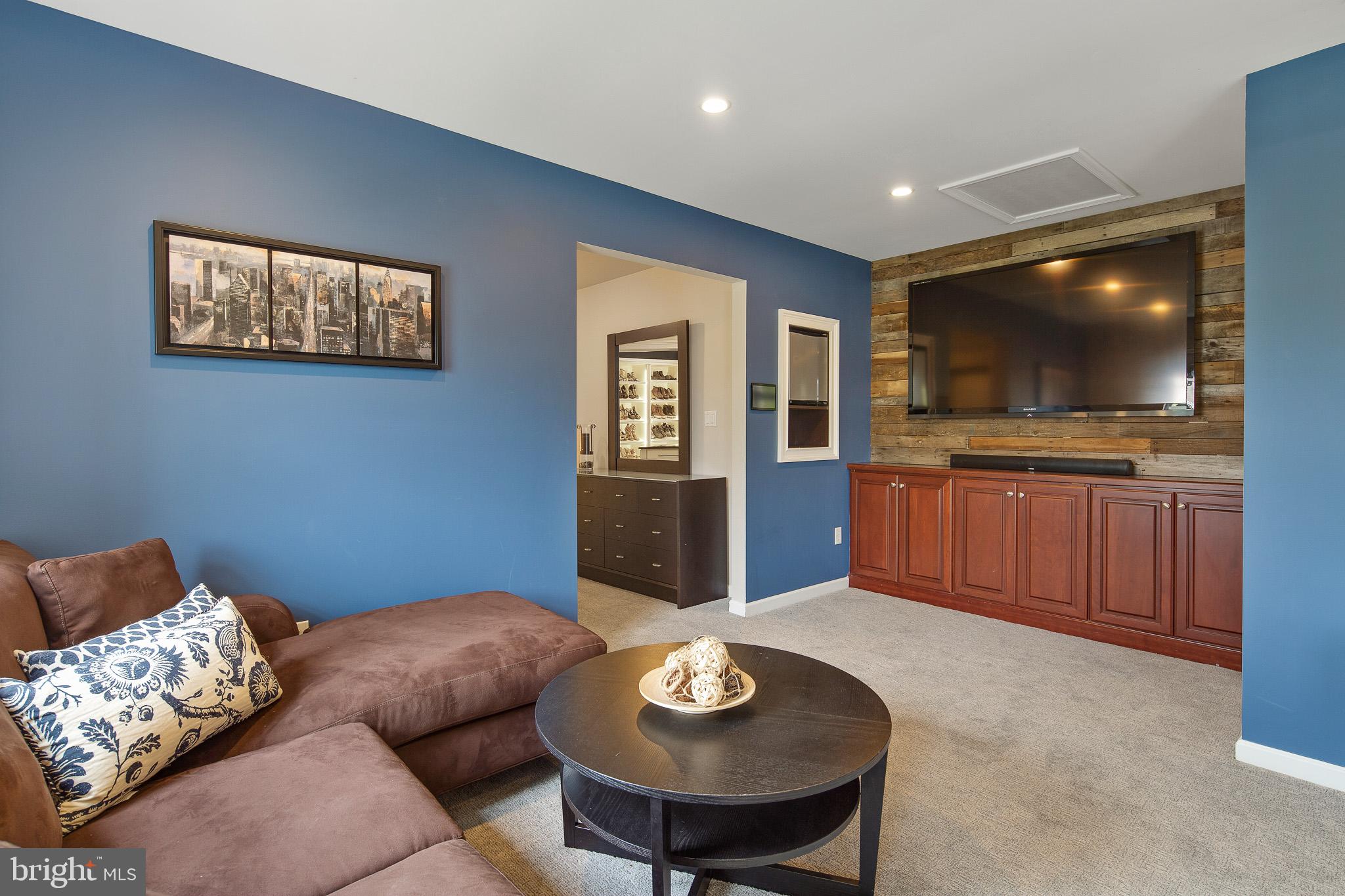 440 Spring Hollow Drive Middletown, DE 19709 - Photo 24 of 64 a living room with furniture and a flat screen tv